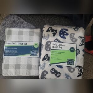 A pair of brand new Full Sheet Sets